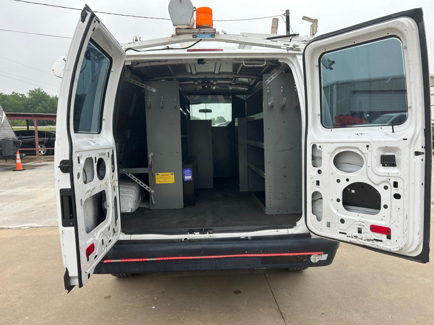 2010 White /Gray Ford E-Series Van E-250 (1FTNE2EL2AD) with an 5.4L V8 SOHC 16V engine, 4-Speed Automatic transmission, located at 17760 Hwy 62, Morris, OK, 74445, (918) 733-4887, 35.609104, -95.877060 - 2010 FORD E-SERIES VAN E-250 5.4 V8 DEDICATED CNG (COMPRESSED NATURAL GAS) DOES NOT RUN ON GASOLINE. FEATURES MANUAL SEATS, MANUAL LOCKS, MANUAL WINDOWS, MANUAL MIRRORS, AM/FM STEREO. IT IS EQUIPPED WITH A CNG FUELING SYSTEM, IT RUNS ON COMPRESSED NATURAL GAS. A PREMIER ALTERNATIVE FUEL THAT IS EXTR - Photo#13